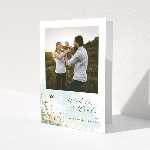 Baby thank you card design with one photo and floral illustrations.