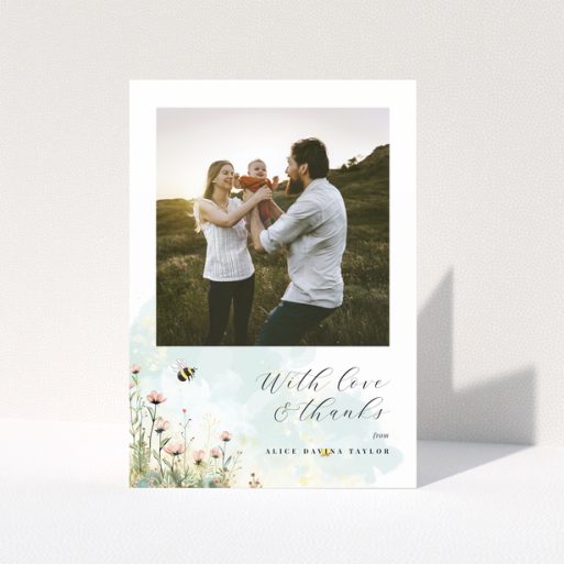 Baby thank you card design with one photo and floral illustrations.