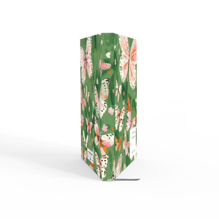 Butterfly themed notebooks design with pink and white butterflies on a green background, featuring no photos