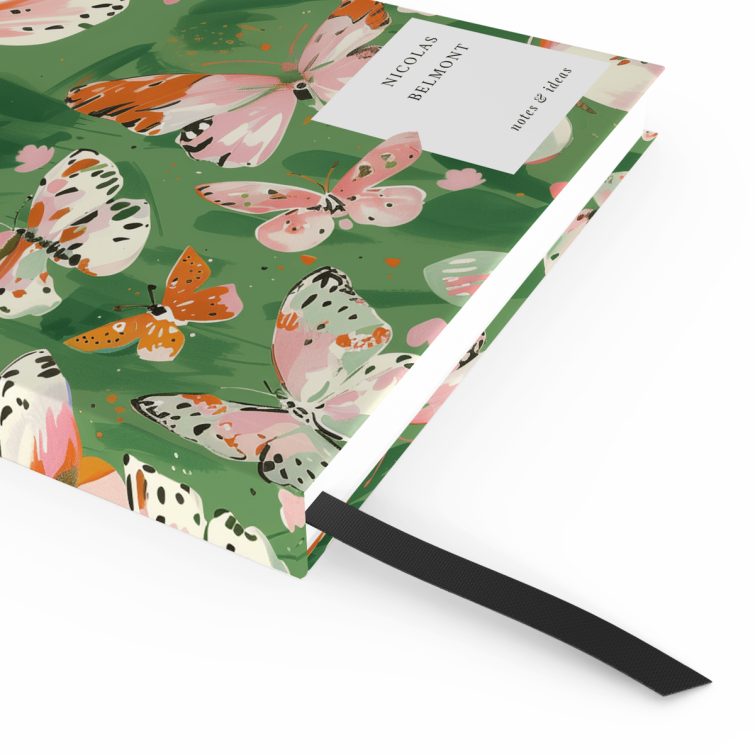 Butterfly themed notebooks design with pink and white butterflies on a green background, featuring no photos