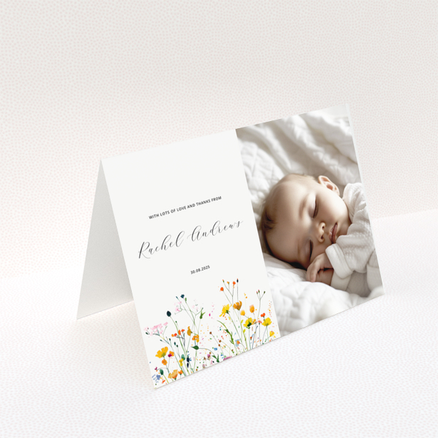 Baby thank you card with floral design and one photo of a sleeping baby.