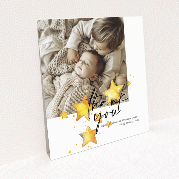 Baby thank you card with a single photo and star illustrations.