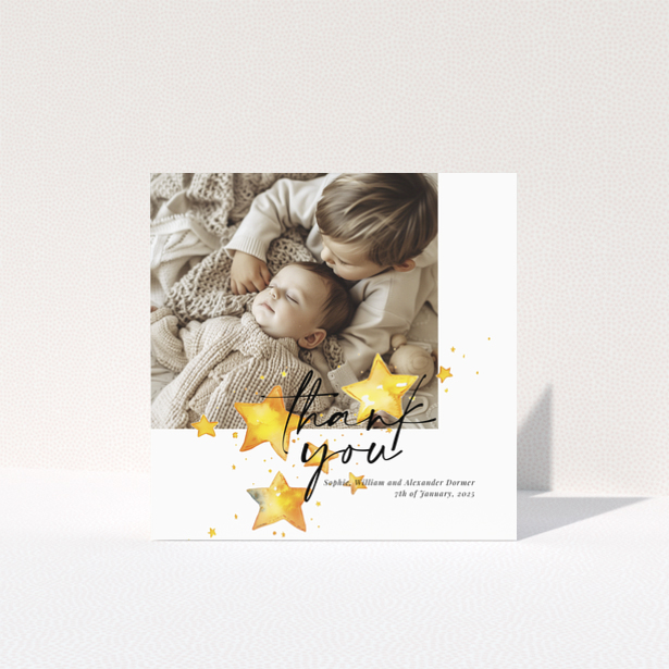 Baby thank you card with a single photo and star illustrations.