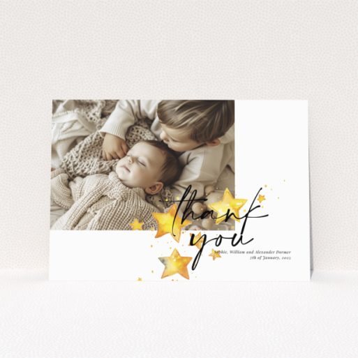 Baby thank you card with a single photo and star illustrations.