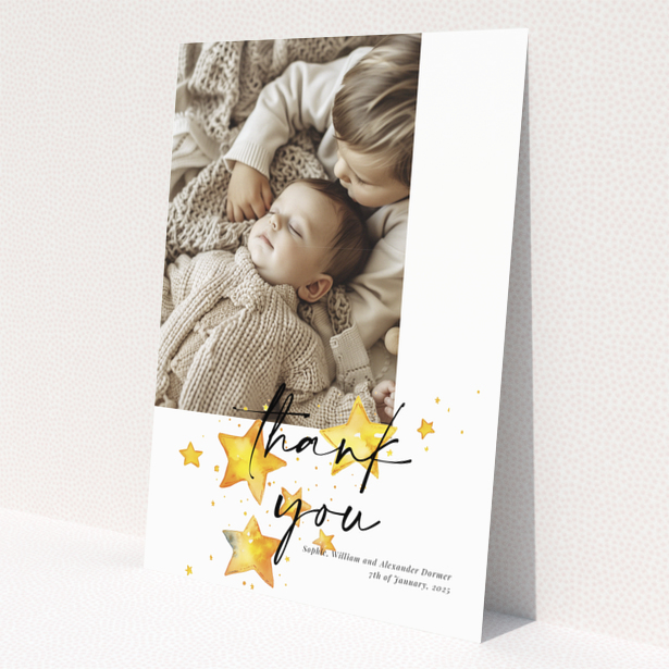 Baby thank you card with a single photo and star illustrations.