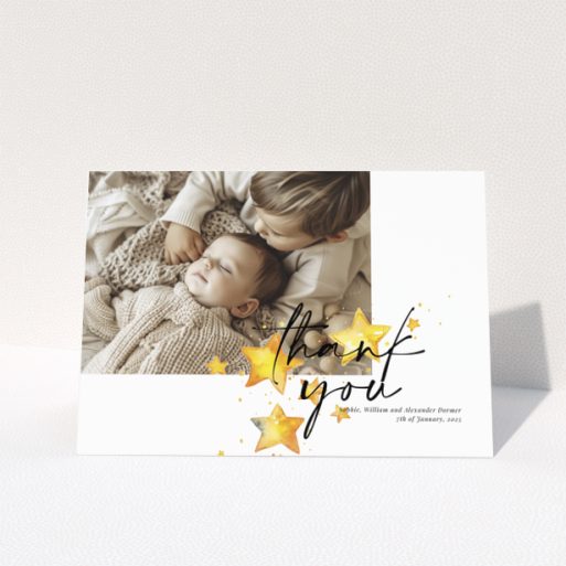 Baby thank you card with a single photo and star illustrations.