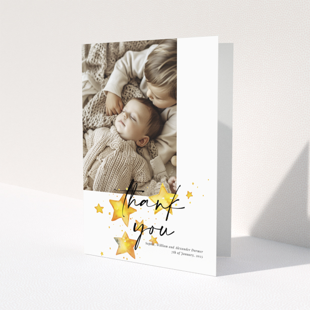 Baby thank you card with a single photo and star illustrations.