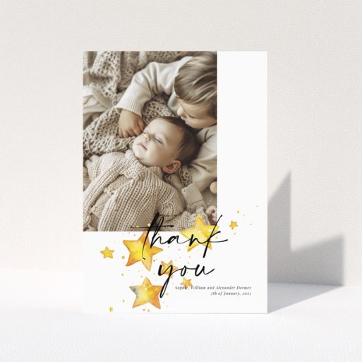 Baby thank you card with a single photo and star illustrations.