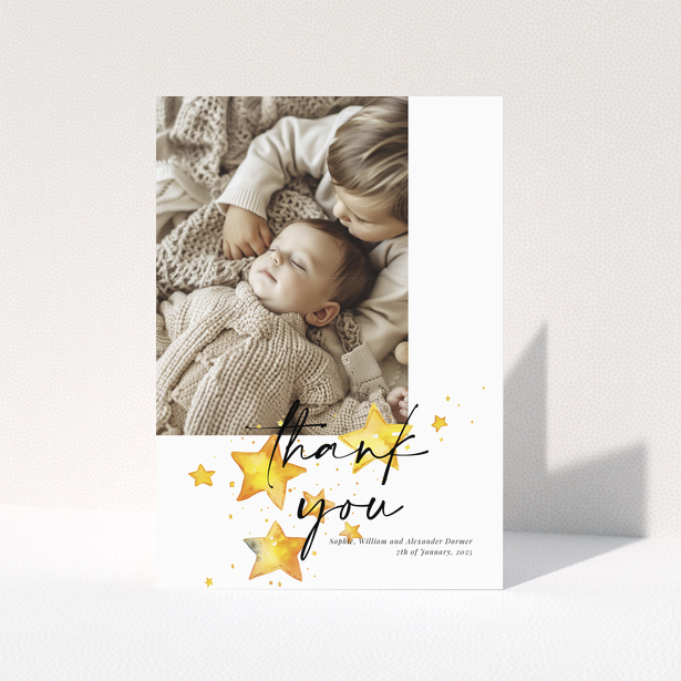 Baby thank you card with a single photo and star illustrations.