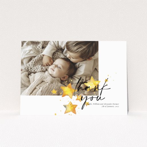 Baby thank you card with a single photo and star illustrations.