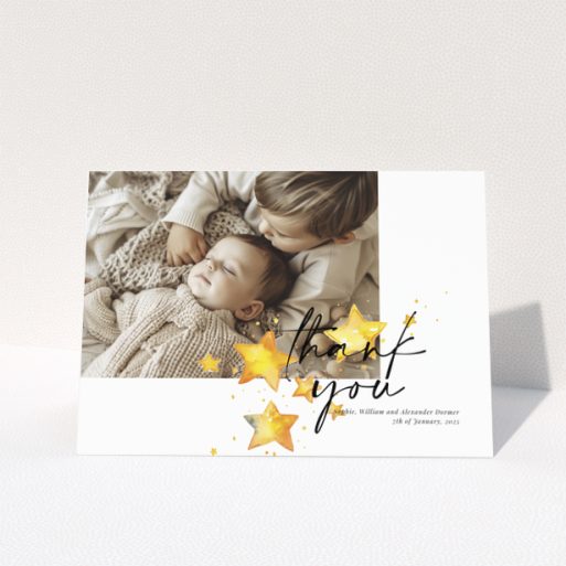 Baby thank you card with a single photo and star illustrations.