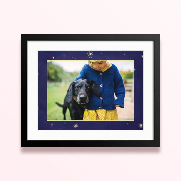 Framed and mounted photo print with one photo featuring a child and a dog.