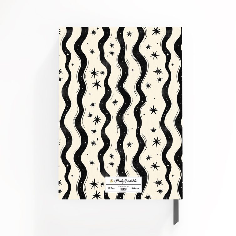 Abstract star and wave pattern design on portrait notebook cover with one photo placeholder.