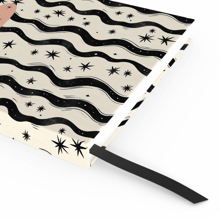 Abstract star and wave pattern design on portrait notebook cover with one photo placeholder.