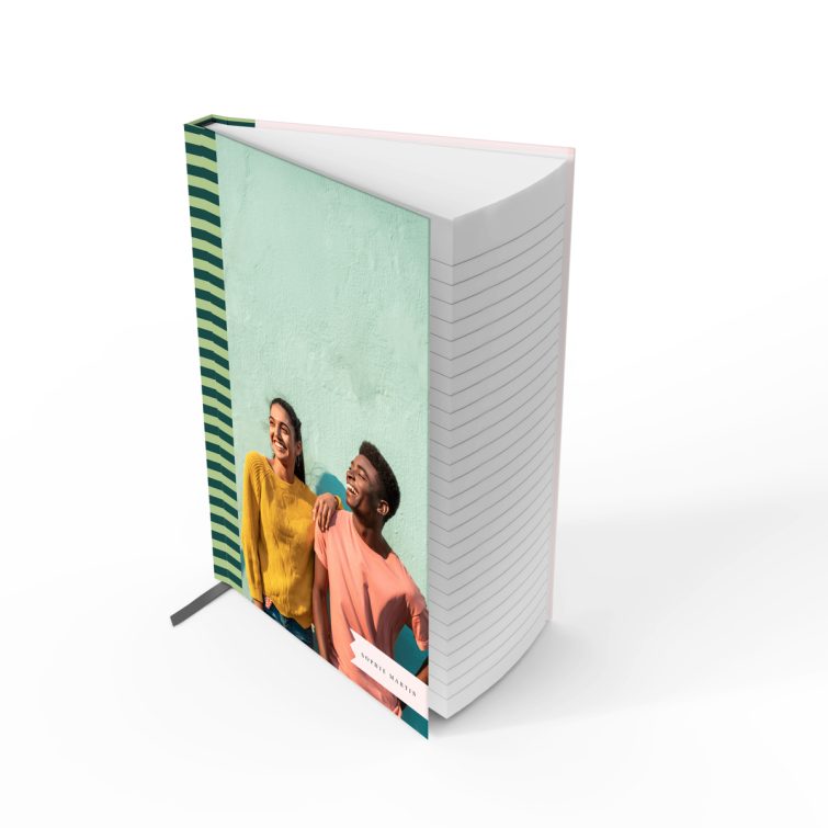 Colourful portrait orientation notebook design with striped patterns and one photo on the cover.