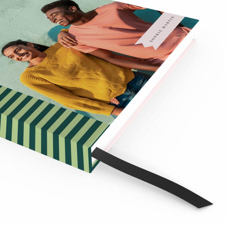 Colourful portrait orientation notebook design with striped patterns and one photo on the cover.