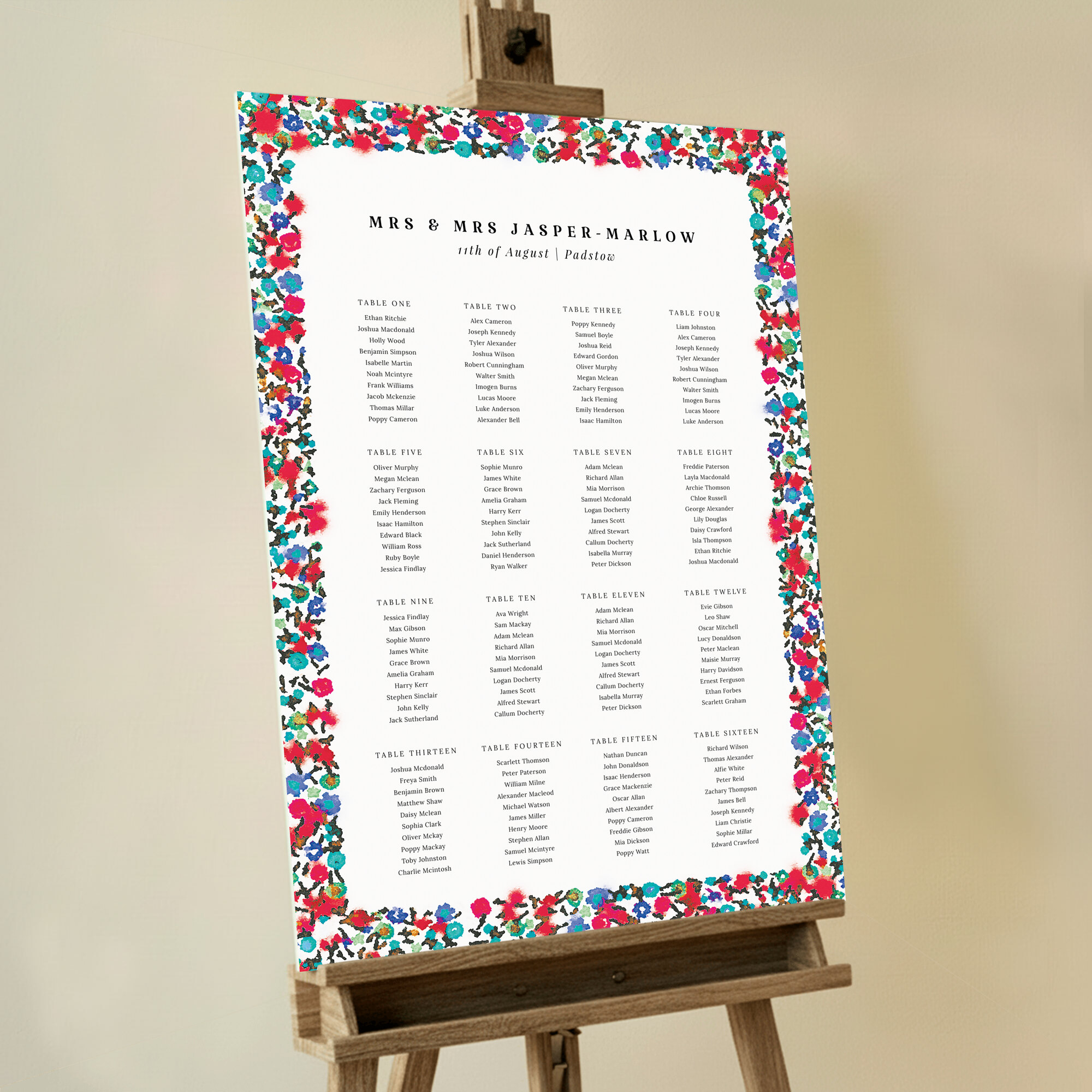 Personalised Summer from a Distance Wedding Seating Charts featuring a bold and bright design with an eye-catching floral border of blue, red, green, and purple flowers, painted and arranged in a dynamic, free-flowing style that captures the vibrant energy and essence of summer.. This design has 16 tables.