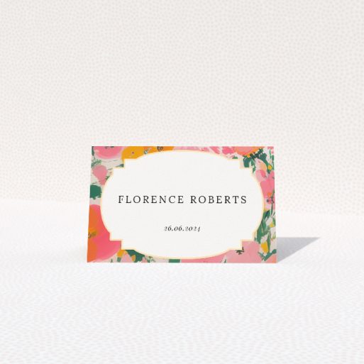 Summer Garden Party place cards table template - lively floral theme in vivid pinks, corals, and greens with classic white space for event details and botanical prints for joyful yet sophisticated tone. This is a view of the front