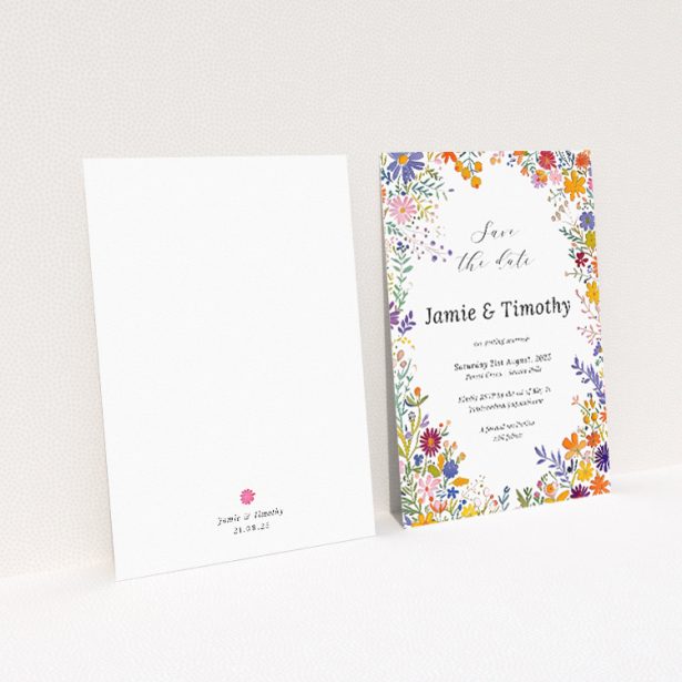 Summerfield Bloom Save the Date card - A6 portrait-oriented design with vibrant meadow flowers encircling a central white text area, evoking the essence of summer joy This is a view of the back
