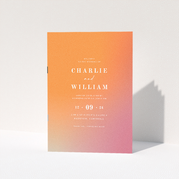 "Sundown Warmth wedding order of service booklet featuring gentle radiance of a setting sun with soft peach to soothing coral gradient, ideal for contemporary weddings and memorable keepsakes.". This is a view of the front