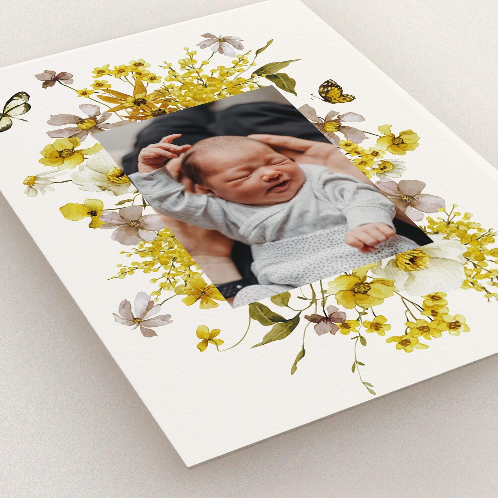 Floral birth announcement card design featuring one photo.