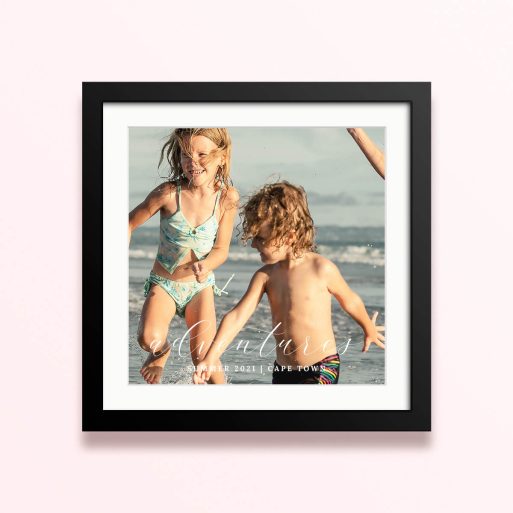 Framed and mounted photo print featuring children playing on the beach, capturing summer adventures in Cape Town.