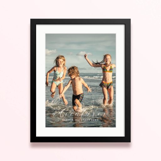 Framed and mounted photo print featuring children playing on the beach, capturing summer adventures in Cape Town.