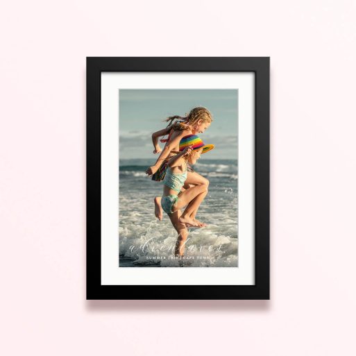 Framed and mounted photo print featuring children playing on the beach, capturing summer adventures in Cape Town.