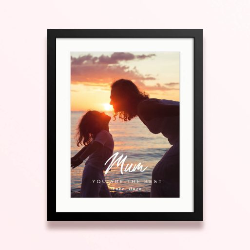 Framed and mounted photo print with one photo at sunset featuring silhouette of two people.