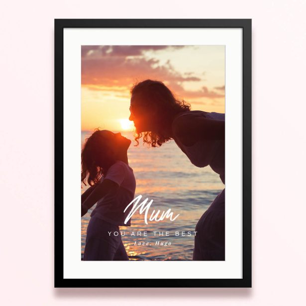 Framed and mounted photo print with one photo at sunset featuring silhouette of two people.