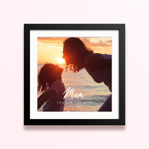 Framed and mounted photo print with one photo at sunset featuring silhouette of two people.