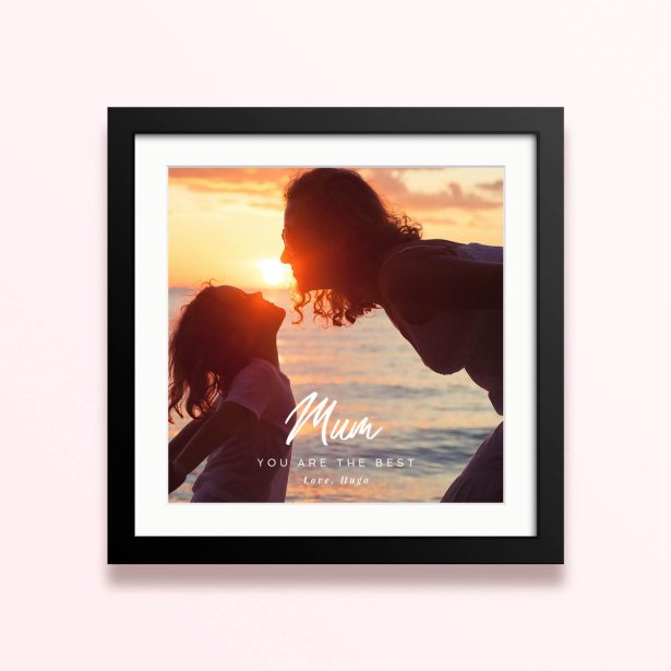 Framed and mounted photo print with one photo at sunset featuring silhouette of two people.