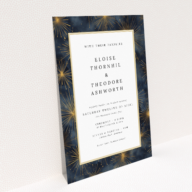"Supernova" wedding invitation featuring a mesmerising deep blue background adorned with golden starbursts, evoking the grandeur of the cosmos for a luxurious and unforgettable celebration This image shows the front and back sides together