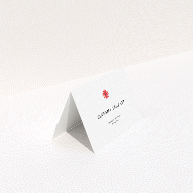 A table place card called "Acrylic Daisy". It is an 85 x 55mm card in a landscape orientation. "Acrylic Daisy" is available as a folded card, with tones of white and red.