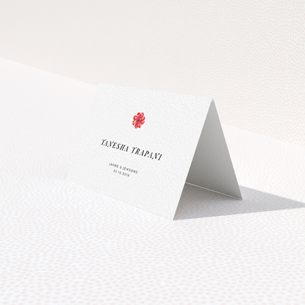 A table place card called "Acrylic Daisy". It is an 85 x 55mm card in a landscape orientation. "Acrylic Daisy" is available as a folded card, with tones of white and red.