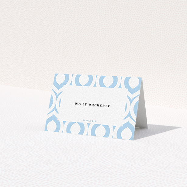 A table place card named 'Arabian diamonds'. It is an 85 x 55mm card in a landscape orientation. 'Arabian diamonds' is available as a folded card, with tones of blue and white.