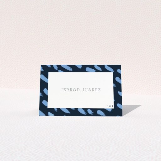 Table Place Card Design - "Blue strokes" A table place card design titled "Blue strokes". It is an 85 x 55mm card in a landscape orientation. "Blue strokes" is available as a folded card, with tones of blue and white.