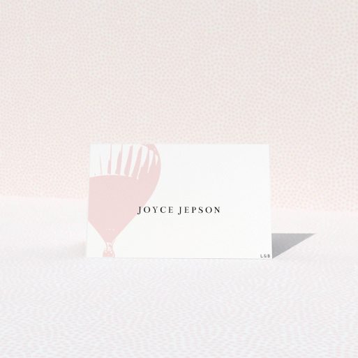 Table Place Card Design - "Drifting Away" A table place card design named "Drifting Away". It is an 85 x 55mm card in a landscape orientation. "Drifting Away" is available as a folded card, with tones of pink and white.