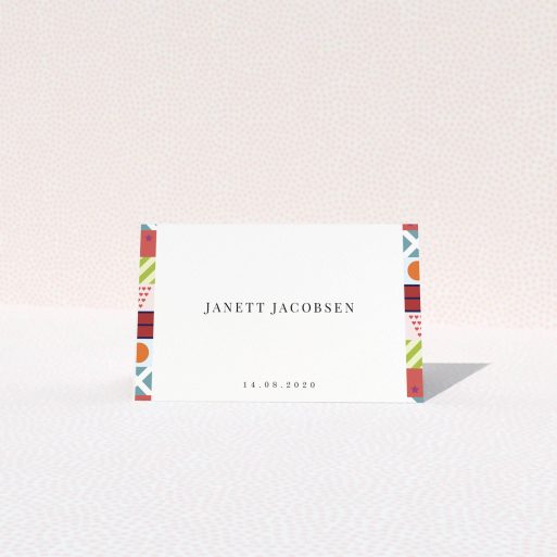 Table Place Card Design - "Epsom" A table place card template titled "Epsom". It is an 85 x 55mm card in a landscape orientation. "Epsom" is available as a folded card, with mainly red colouring.