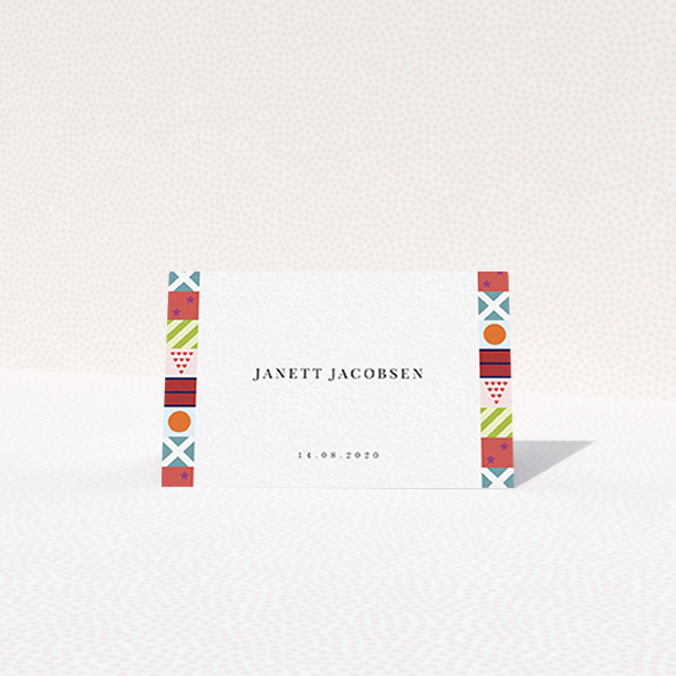 A table place card template titled "Epsom". It is an 85 x 55mm card in a landscape orientation. "Epsom" is available as a folded card, with mainly red colouring.