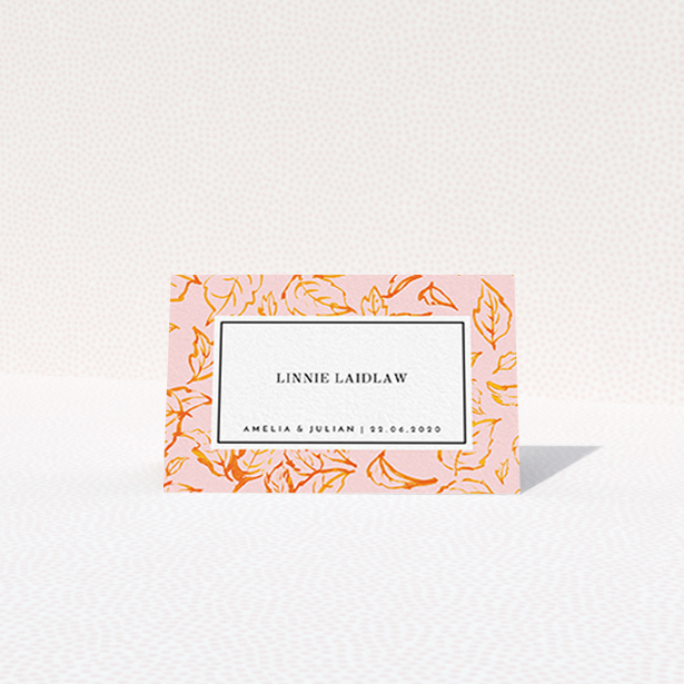 A table place card design called "Falling Foliage". It is an 85 x 55mm card in a landscape orientation. "Falling Foliage" is available as a folded card, with tones of pink and orange.