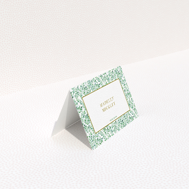 A table place card design named "From the hedge". It is an 85 x 55mm card in a landscape orientation. "From the hedge" is available as a folded card, with tones of green and white.