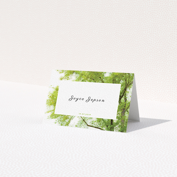A table place card design called 'In the Field'. It is an 85 x 55mm card in a landscape orientation. 'In the Field' is available as a folded card, with tones of green and white.