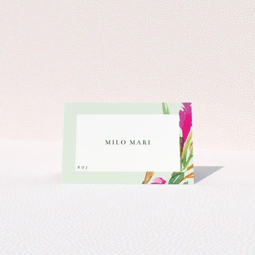 Table Place Card Design - "Jungle collection" A table place card design named "Jungle collection". It is an 85 x 55mm card in a landscape orientation. "Jungle collection" is available as a folded card, with tones of light green and pink.
