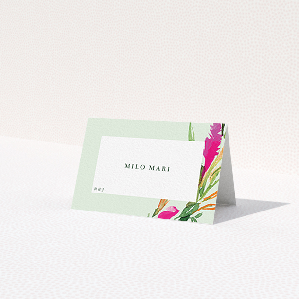 A table place card design named 'Jungle collection'. It is an 85 x 55mm card in a landscape orientation. 'Jungle collection' is available as a folded card, with tones of light green and pink.