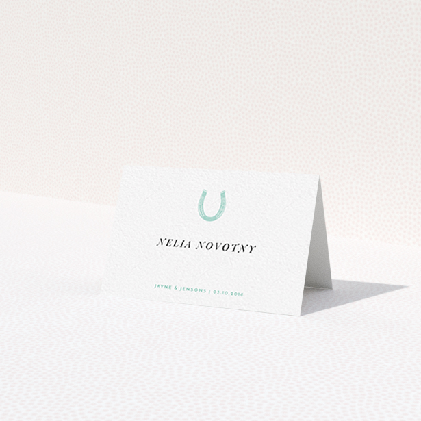 A table place card template titled "Lucky horse shoe". It is an 85 x 55mm card in a landscape orientation. "Lucky horse shoe" is available as a folded card, with tones of white and blue.