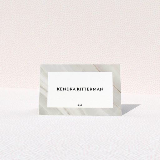 Table Place Card Design - "Marble Swerve" A table place card design titled "Marble Swerve". It is an 85 x 55mm card in a landscape orientation. "Marble Swerve" is available as a folded card, with tones of grey and white.