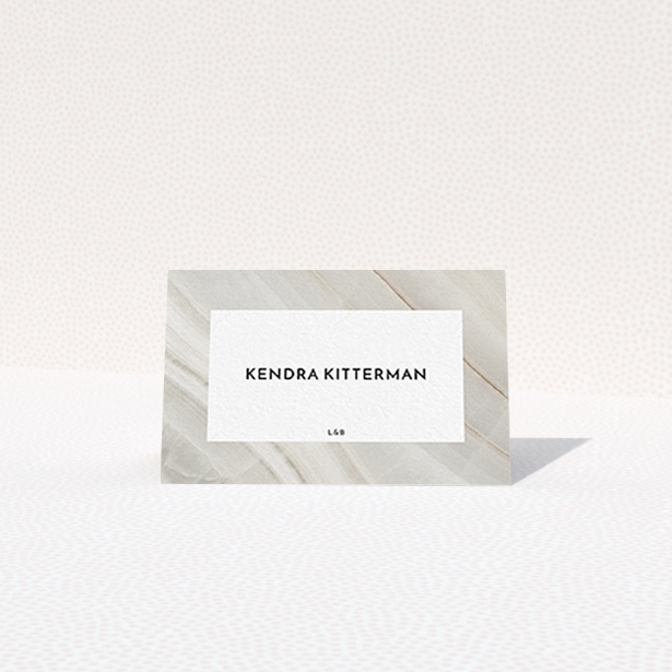 A table place card design titled "Marble Swerve". It is an 85 x 55mm card in a landscape orientation. "Marble Swerve" is available as a folded card, with tones of grey and white.