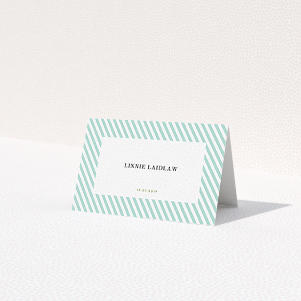 A table place card called 'Mint Diagonals'. It is an 85 x 55mm card in a landscape orientation. 'Mint Diagonals' is available as a folded card, with tones of green and white.