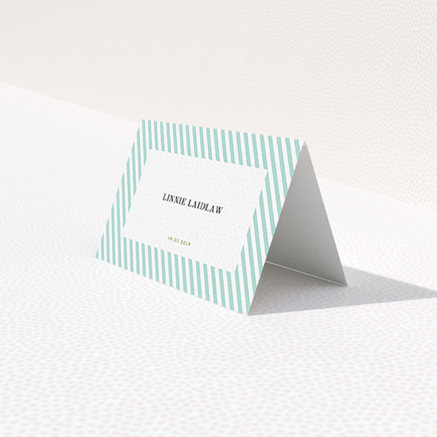 A table place card called "Mint Diagonals". It is an 85 x 55mm card in a landscape orientation. "Mint Diagonals" is available as a folded card, with tones of green and white.